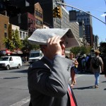 048 - 12.15PM - 7th Ave at 25th st. - a makeshift hat