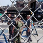 089 - Thu 1PM - highway patrol and national guard blocking the street
