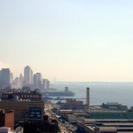 113 - Thu 2PM - downtown still smokes, the statue of liberty off to the right